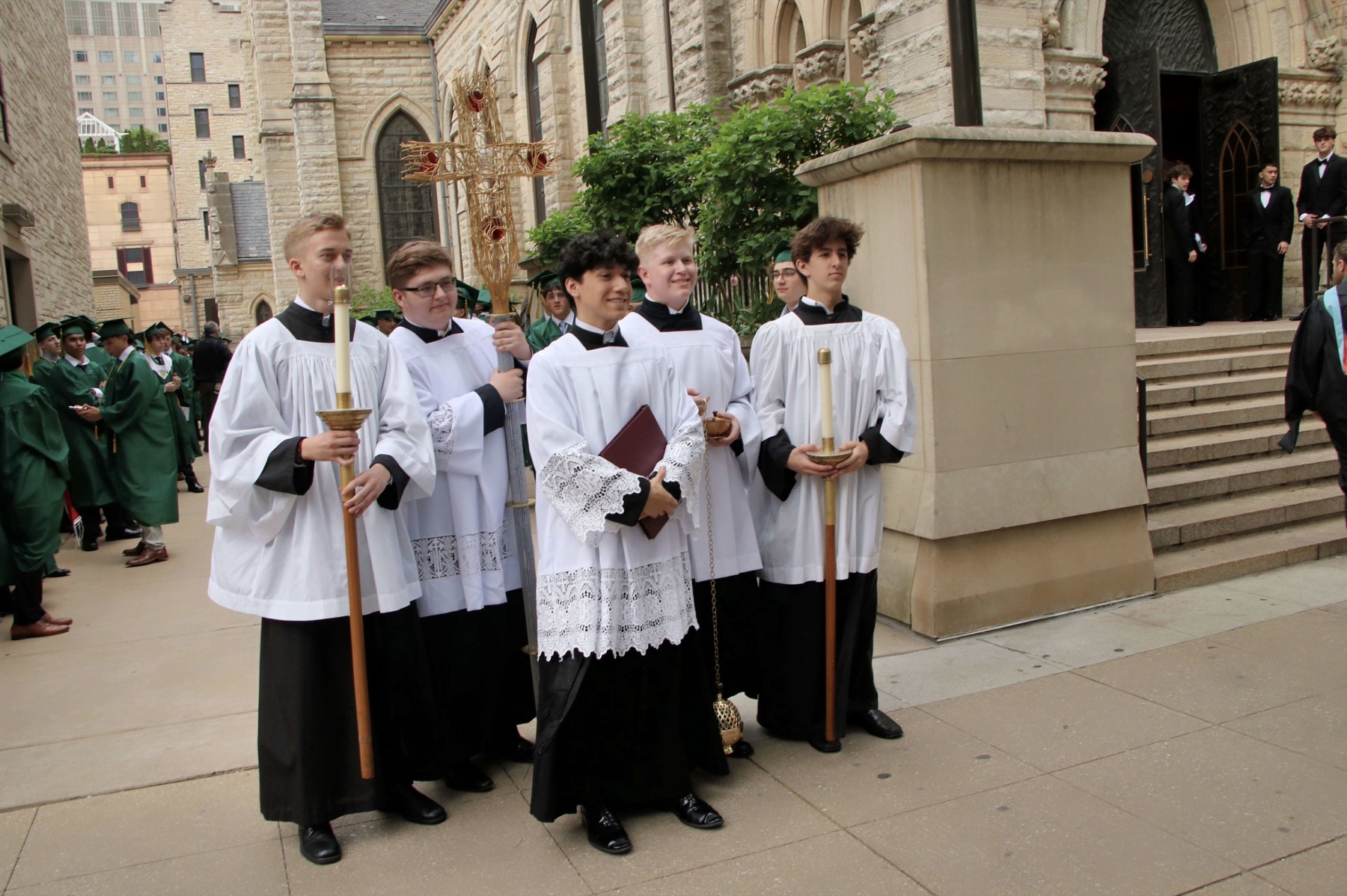 Altar servers outside the church