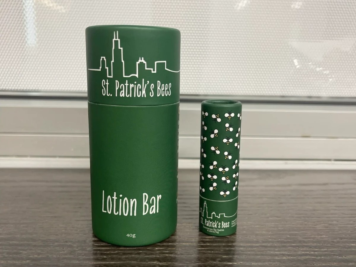 St. Patrick's Bees lotion bar and lip balm in their green tube packaging