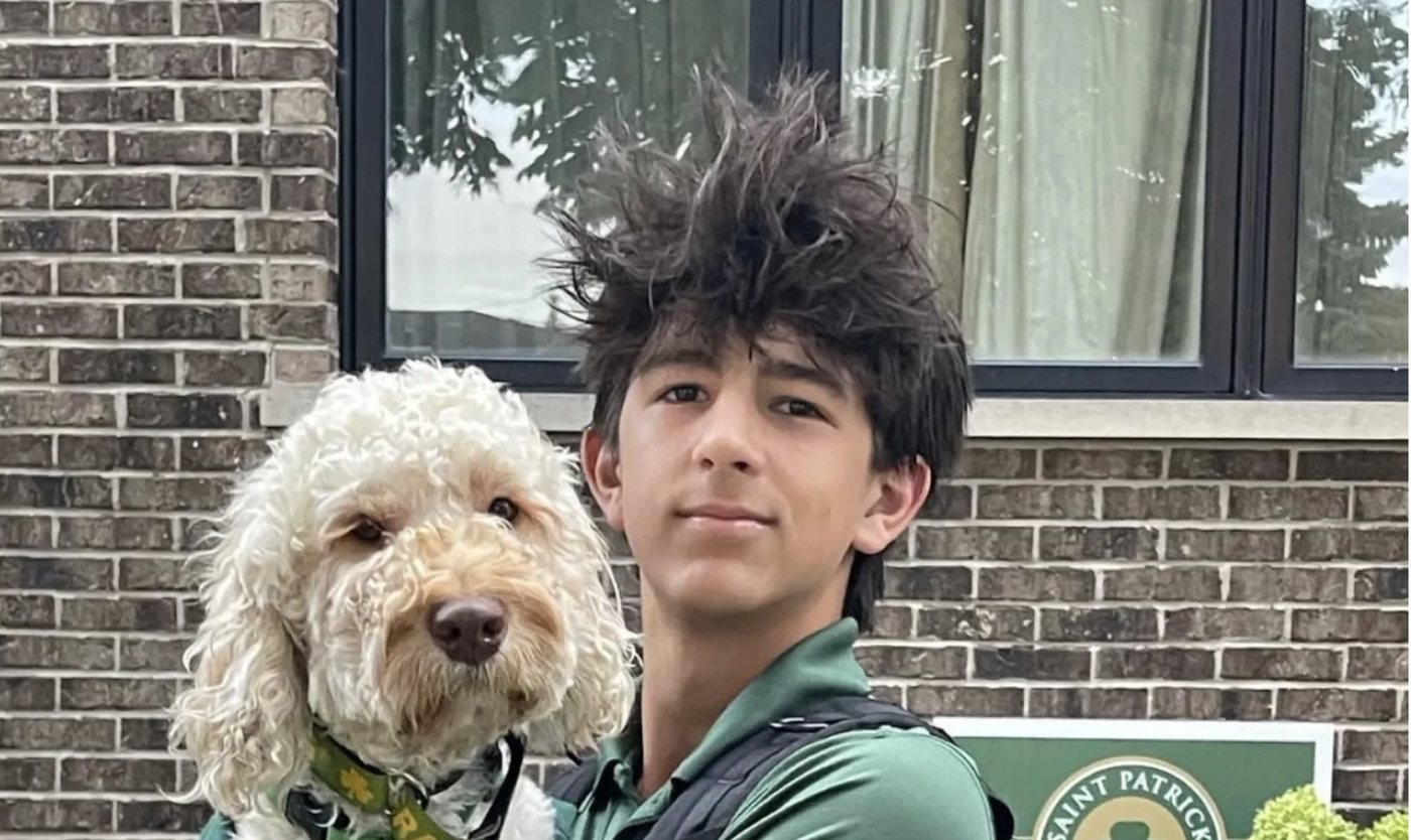 Rocco with a dog from the Tails of Love therapy dog program