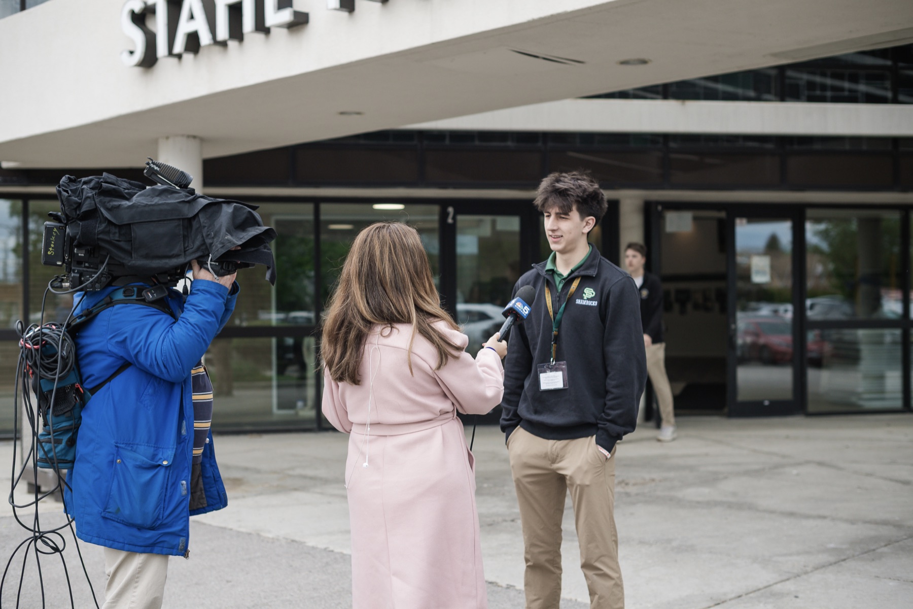 Rocco Moroko being interviewed by NBC 5 Chicago outside St. Patrick High School